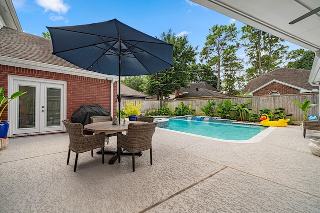 12927 Finch Brook Dr, Cypress, TX 77429 - view of swimming pool with french doors, a fenced backyard, a patio area, and grilling area