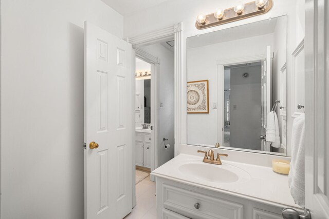 12927 Finch Brook Dr, Cypress, TX 77429 - bathroom featuring vanity and tile patterned flooring