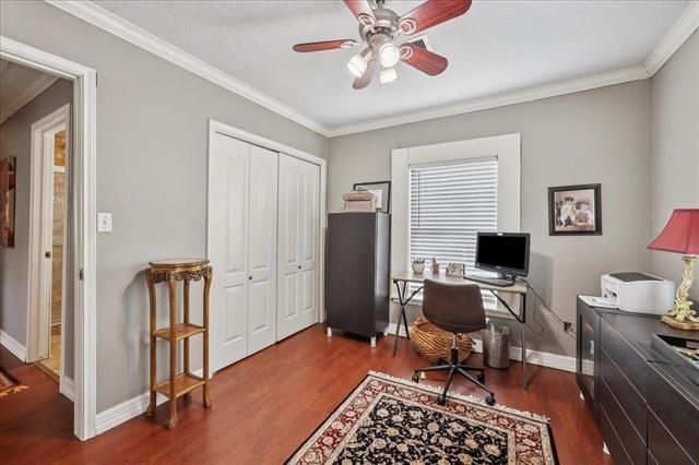 3231 Charles Ave, Groves, TX 77619 - office space with wood finished floors, ornamental molding, and ceiling fan