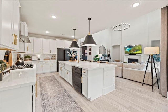 19011 Festival Hill Ct, Cypress, TX 77433 - kitchen with black dishwasher, white cabinetry, backsplash, recessed lighting, and light wood finished floors