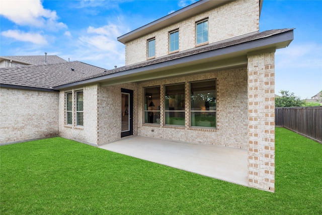 19011 Festival Hill Ct, Cypress, TX 77433 - rear view of house with a patio, brick siding, and a shingled roof