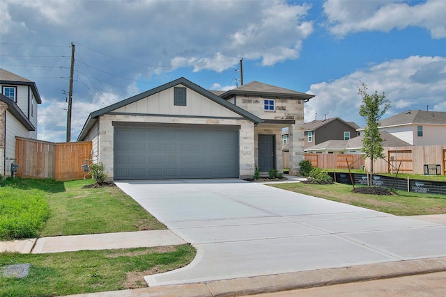 2971 Colonia Blossom Ln, Pinehurst, TX 77362 - view of front of home featuring a garage, concrete driveway, board and batten siding, and stone siding