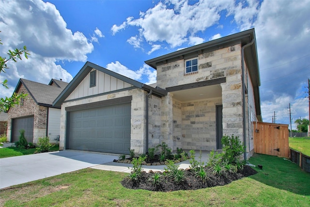 2971 Colonia Blossom Ln, Pinehurst, TX 77362 - view of front of property with stone siding, an attached garage, a front yard, board and batten siding, and concrete driveway
