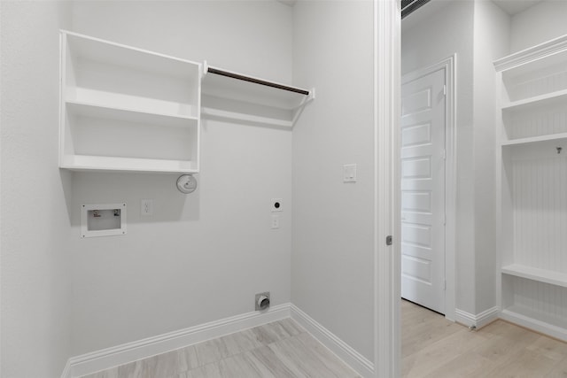 2348 Blue Sail Dr, Katy, TX 77493 - washroom with electric dryer hookup, hookup for a washing machine, gas dryer hookup, and light wood-type flooring