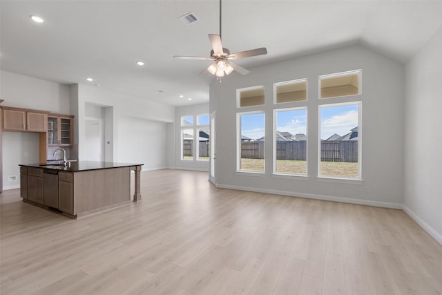 2348 Blue Sail Dr, Katy, TX 77493 - unfurnished living room with ceiling fan, light wood-type flooring, and recessed lighting