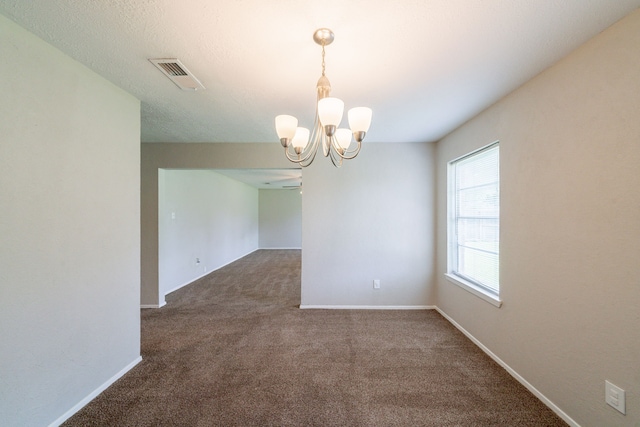10006 Peachridge Dr, Houston, TX 77070 - carpeted spare room with a chandelier and baseboards
