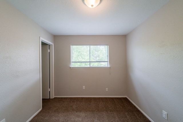 10006 Peachridge Dr, Houston, TX 77070 - carpeted empty room with baseboards