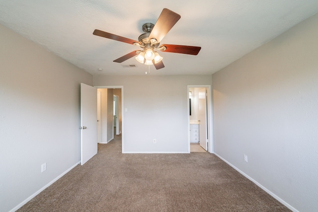 10006 Peachridge Dr, Houston, TX 77070 - unfurnished bedroom featuring carpet floors, ensuite bathroom, and ceiling fan