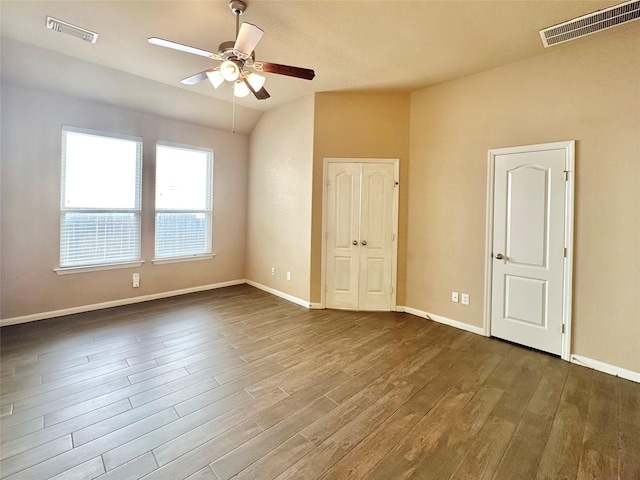 4315 Wellington Grove Ln, Katy, TX 77494 - unfurnished bedroom featuring vaulted ceiling, dark wood-style flooring, and ceiling fan