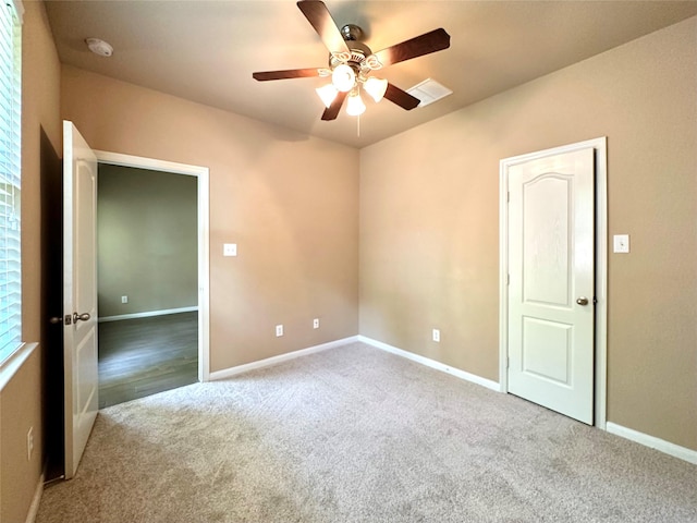 4315 Wellington Grove Ln, Katy, TX 77494 - spare room with carpet floors, a smoke detector, and a ceiling fan