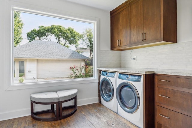 2037 Banks, Houston, TX 77098 - laundry room featuring cabinet space, healthy amount of natural light, washer and dryer, and wood finished floors