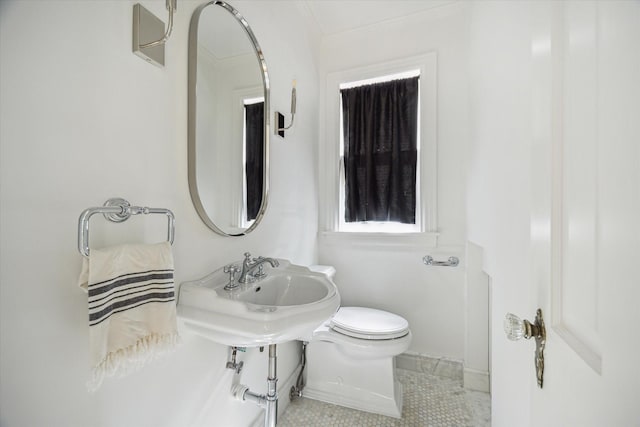 2037 Banks, Houston, TX 77098 - half bathroom with ornamental molding and tile patterned floors