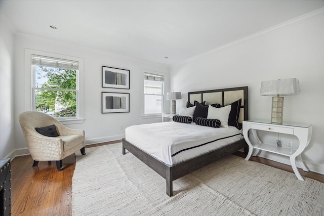2037 Banks, Houston, TX 77098 - bedroom with wood finished floors, multiple windows, and ornamental molding
