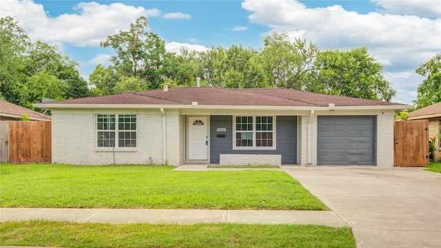 422 Gammon Dr, Houston, TX 77022 - single story home with a garage, concrete driveway, brick siding, and a porch
