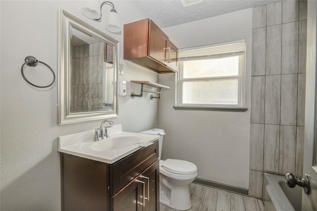 422 Gammon Dr, Houston, TX 77022 - bathroom featuring vanity and wood finished floors