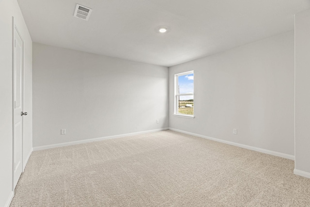 10811 Bright Beacon Dr, Beasley, TX 77417 - spare room with light colored carpet and recessed lighting