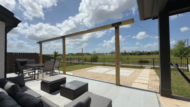 31422 Beacon Cove Trl, Fulshear, TX 77441 - fenced backyard with outdoor dining area, a patio area, and an outdoor hangout area