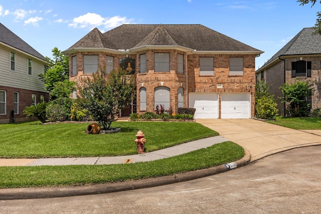 5110 Scottline Dr, Pasadena, TX 77505 - french country style house with brick siding, driveway, an attached garage, a front lawn, and roof with shingles