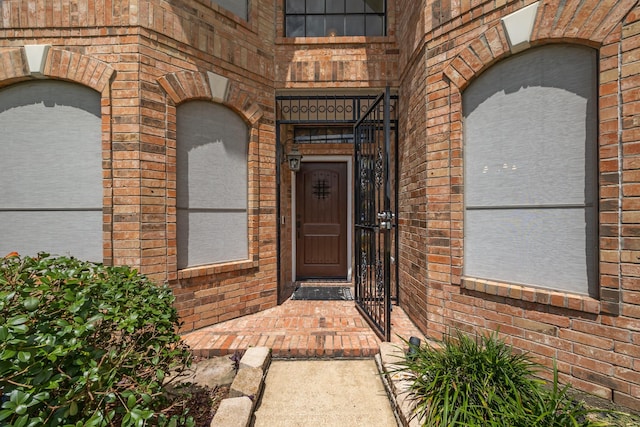5110 Scottline Dr, Pasadena, TX 77505 - doorway to property featuring brick siding