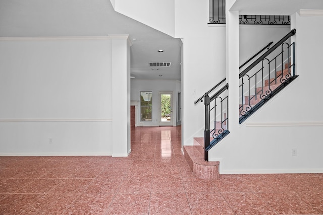 5110 Scottline Dr, Pasadena, TX 77505 - entrance foyer featuring crown molding, stairs, and recessed lighting