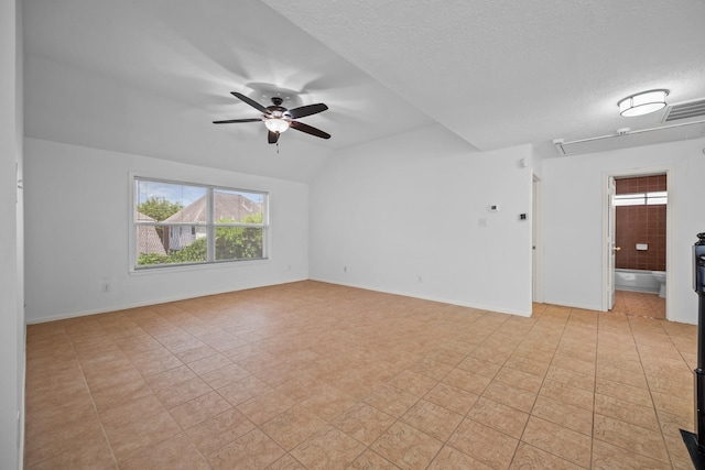 5110 Scottline Dr, Pasadena, TX 77505 - unfurnished room with a ceiling fan, a textured ceiling, and lofted ceiling