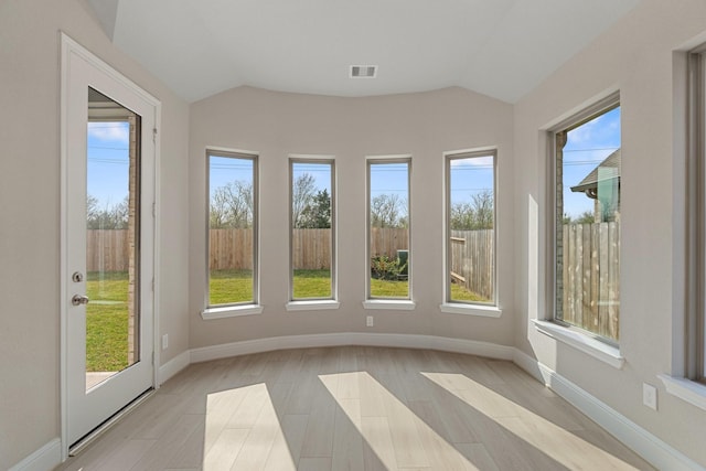 914 Hooks Trl, League City, TX 77573 - unfurnished sunroom featuring lofted ceiling and baseboards