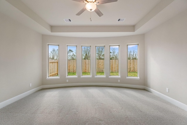 914 Hooks Trl, League City, TX 77573 - carpeted empty room featuring a raised ceiling and ceiling fan