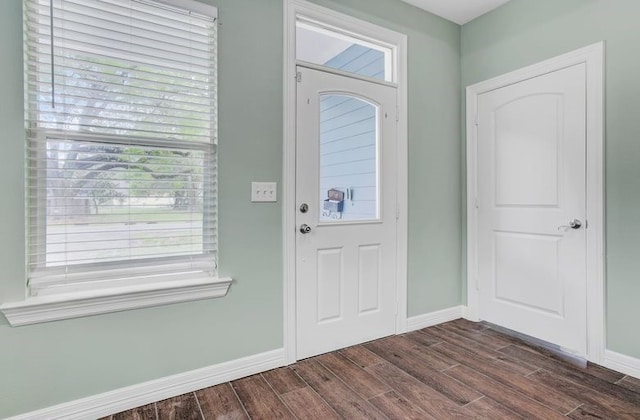 2245 Wilson St, Beaumont, TX 77703 - entrance foyer with dark wood-style flooring and baseboards