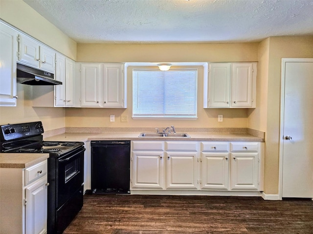 16502 Royal Mile Ln, Houston, TX 77084 - kitchen featuring black appliances, under cabinet range hood, white cabinetry, light countertops, and a textured ceiling
