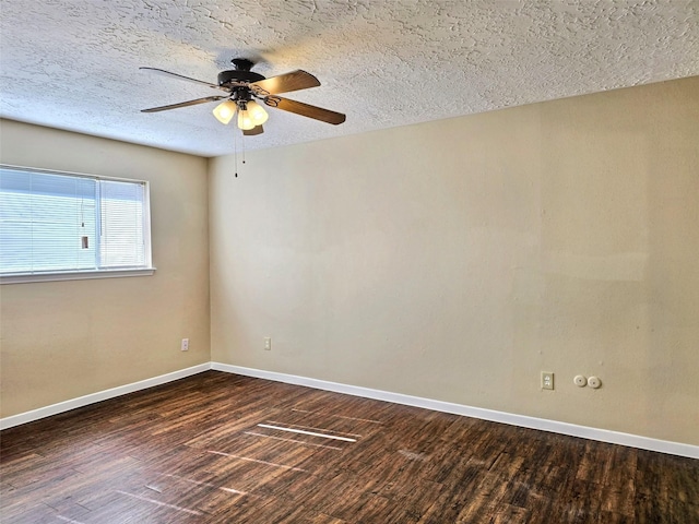 16502 Royal Mile Ln, Houston, TX 77084 - unfurnished room with dark wood-style flooring, ceiling fan, and a textured ceiling