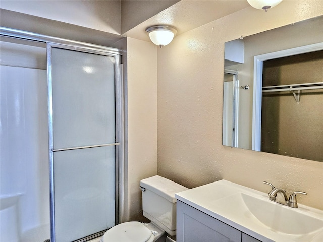 16502 Royal Mile Ln, Houston, TX 77084 - bathroom with vanity, a stall shower, and a walk in closet