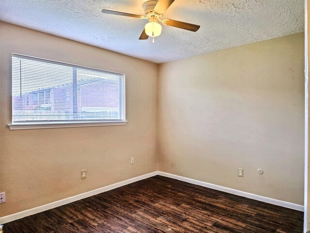 16502 Royal Mile Ln, Houston, TX 77084 - unfurnished room featuring a textured ceiling, dark wood-style flooring, and a ceiling fan