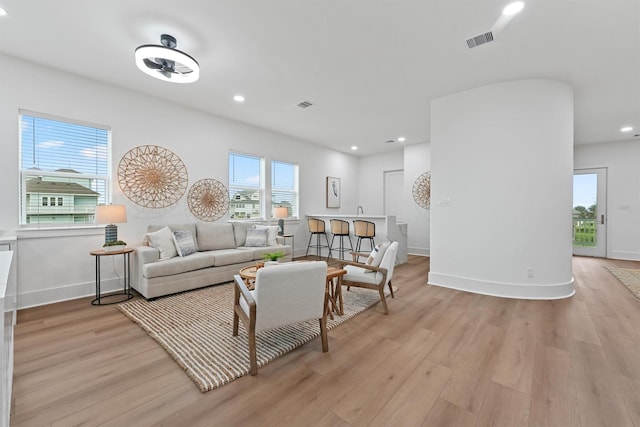 21330 Scissor Tail Ln, Galveston, TX 77554 - living room with light wood finished floors, recessed lighting, and ceiling fan