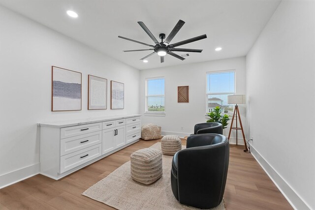 21330 Scissor Tail Ln, Galveston, TX 77554 - living area with a ceiling fan, light wood finished floors, and recessed lighting
