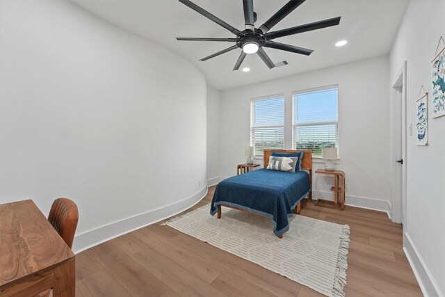 21330 Scissor Tail Ln, Galveston, TX 77554 - bedroom with wood finished floors, recessed lighting, and a ceiling fan