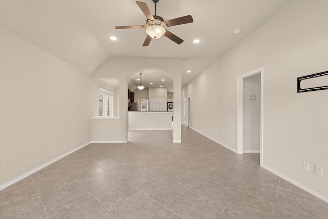 4211 Ponderosa Hills Ln, Katy, TX 77494 - unfurnished living room featuring a ceiling fan, light tile patterned floors, recessed lighting, and arched walkways