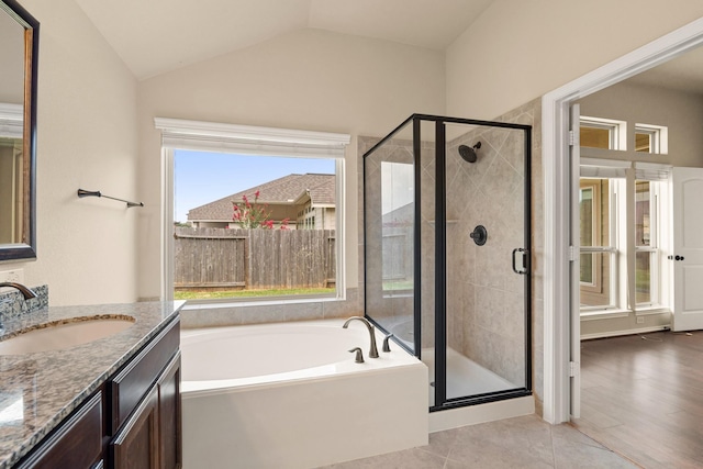 4211 Ponderosa Hills Ln, Katy, TX 77494 - full bathroom featuring a garden tub, vanity, a stall shower, vaulted ceiling, and tile patterned floors