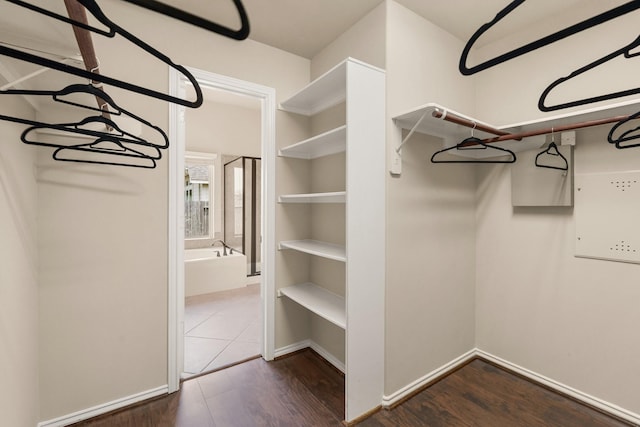 4211 Ponderosa Hills Ln, Katy, TX 77494 - walk in closet with wood finished floors
