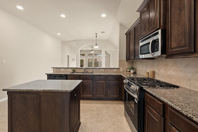 4211 Ponderosa Hills Ln, Katy, TX 77494 - kitchen featuring stainless steel appliances, backsplash, ceiling fan, dark brown cabinets, and recessed lighting