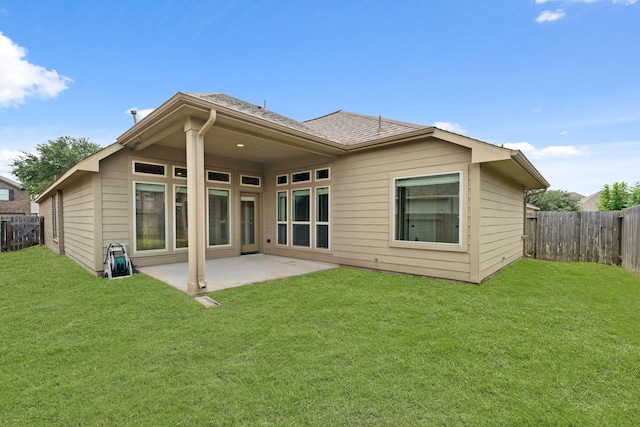 4211 Ponderosa Hills Ln, Katy, TX 77494 - back of house featuring a patio, a fenced backyard, and a shingled roof