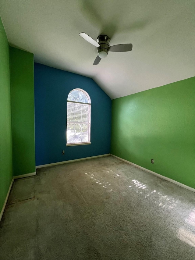 20019 Sterling Meadow Ct, Katy, TX 77449 - unfurnished room with vaulted ceiling, ceiling fan, and carpet
