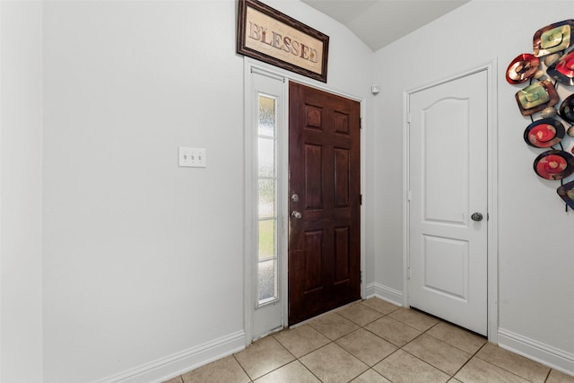7622 Crestbrook Manor Ln, Cypress, TX 77433 - foyer entrance with plenty of natural light, light tile patterned floors, and vaulted ceiling