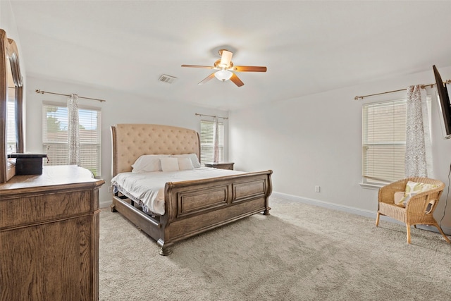 7622 Crestbrook Manor Ln, Cypress, TX 77433 - carpeted bedroom with multiple windows and ceiling fan
