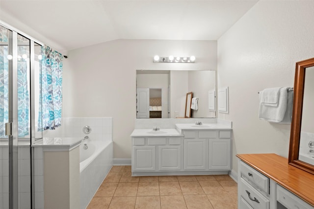 7622 Crestbrook Manor Ln, Cypress, TX 77433 - full bath featuring tile patterned flooring, double vanity, a garden tub, lofted ceiling, and a shower with shower door