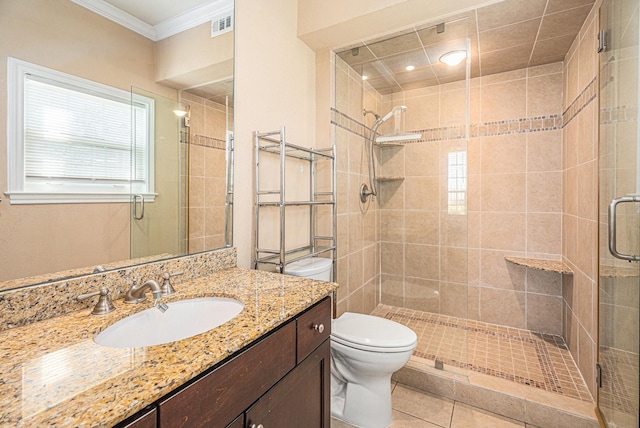 7000 Seawall Blvd Unit 611, Galveston, TX 77551 - bathroom featuring ornamental molding, vanity, a stall shower, and tile patterned flooring