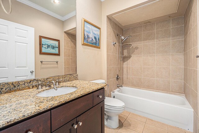 7000 Seawall Blvd Unit 611, Galveston, TX 77551 - bathroom with crown molding, tile patterned flooring, vanity, and shower / bathtub combination