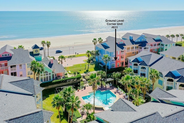 7000 Seawall Blvd Unit 611, Galveston, TX 77551 - aerial view of waterfront with a beach and a pool