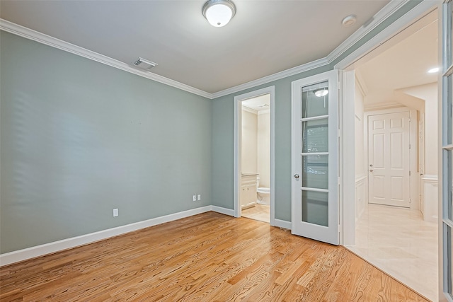 2616 Helena St, Houston, TX 77006 - unfurnished room featuring a smoke detector, light wood finished floors, and crown molding