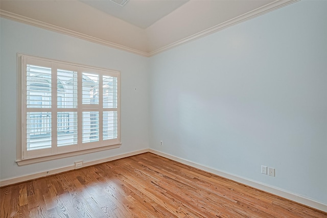 2616 Helena St, Houston, TX 77006 - spare room with light wood-type flooring and ornamental molding