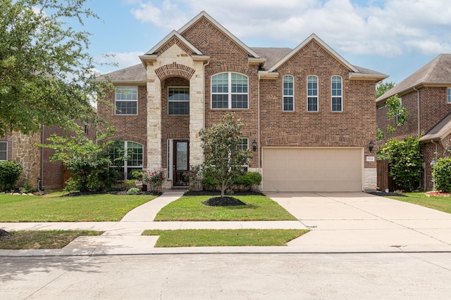 5314 Belle Manor Ln, Sugar Land, TX 77479 - view of front of property featuring brick siding, concrete driveway, an attached garage, and a front lawn